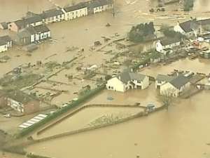 Ущерб, причиненный наводнениями имуществу и жителям английского графства Камбрия и южной Шотландии, оценивается в 100 миллионов фунтов стерлингов (165 миллионов долларов). Фото: Вести.Ru