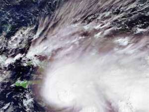Спутниковый снимок тропического шторма, переданный по каналам AFP