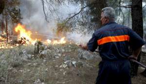 Столица Черногории окутана смогом от лесных пожаров. Фото EPA с сайта &quot;Голос России&quot;